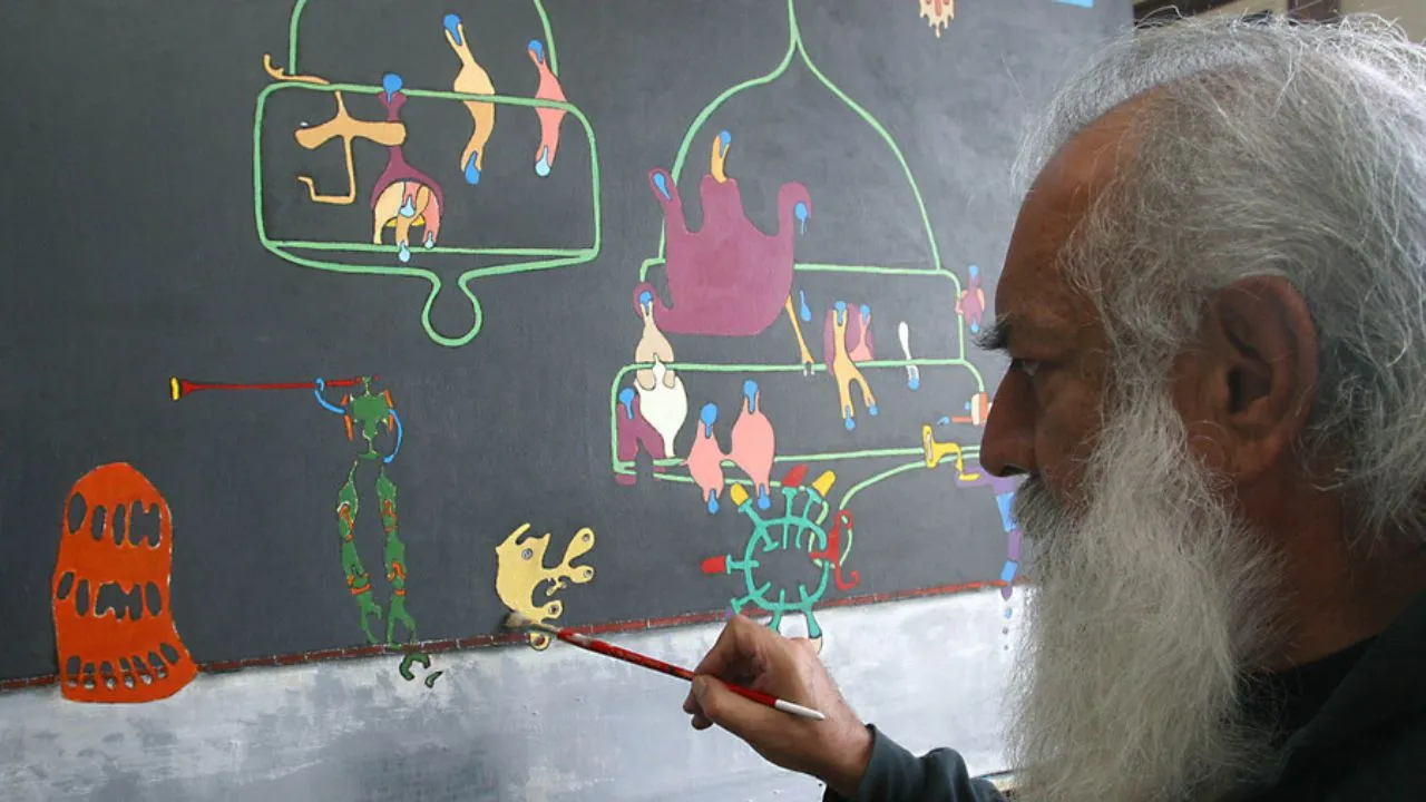 Gustavo Angarita (q. e. p. d.), actor colombiano, en su taller de pintura.